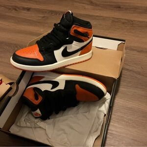 Nike Air Jordan Black and Orange Sneakers